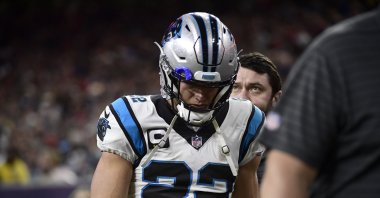 Carolina Panthers running back Christian McCaffrey (22) leaves the field during the first half of an NFL football game against the Houston Texans at NRG Stadium, Houston, Texas, U.S., Sept. 23, 2021. (AP Photo)