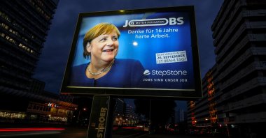 A poster with a picture of Chancellor Angela Merkel that reads "Mother of the nation. Thank you for 16 years of hard work," is seen before the general elections in Berlin, Germany, Sept. 23, 2021. (Reuters Photo)