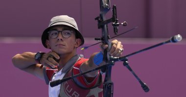Turkey's Mete Gazoz shoots an arrow during the individual eliminations at the 2020 Summer Olympics, in Tokyo, Japan, July 29, 2021. (AP Photo)