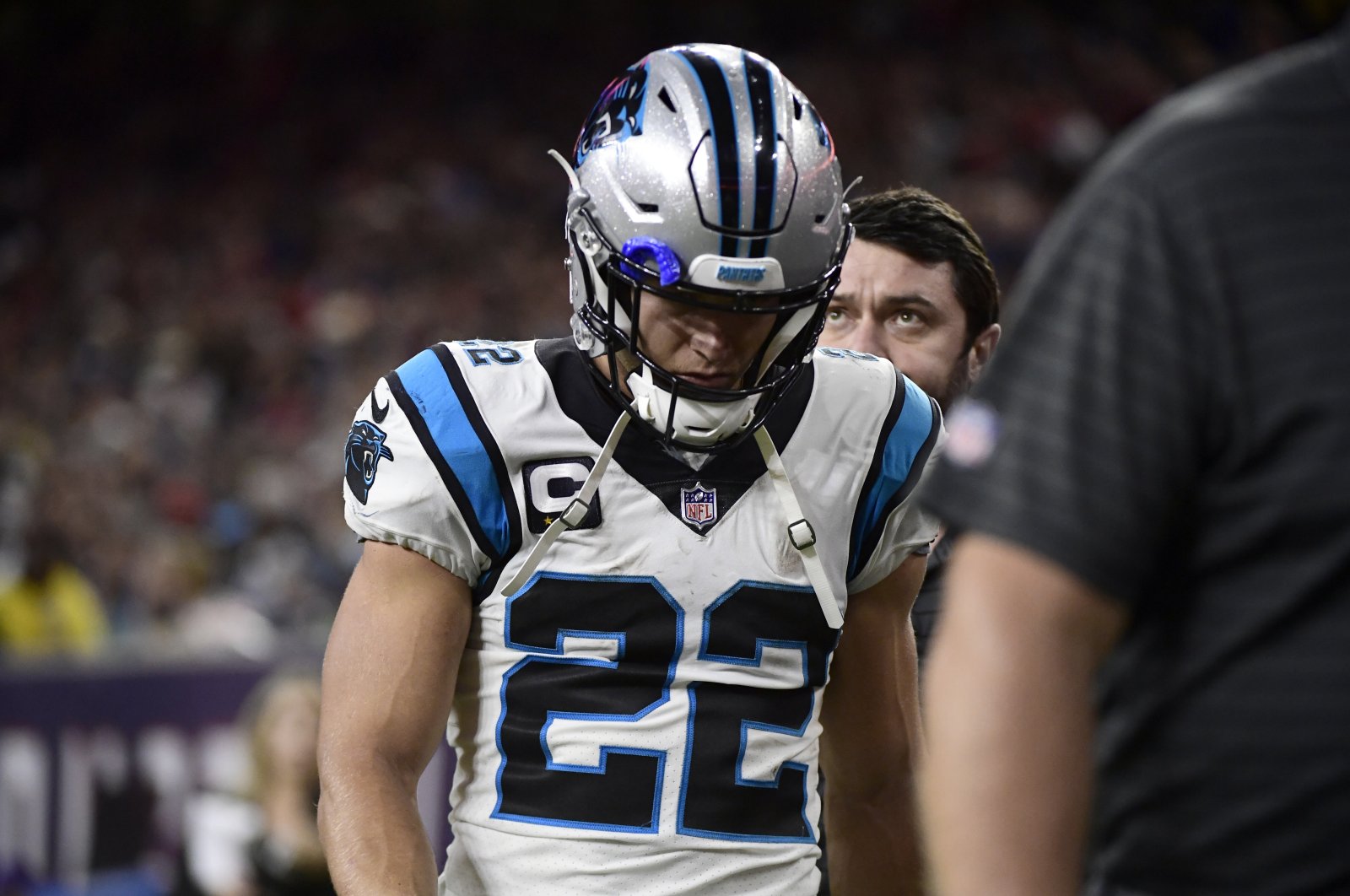Carolina Panthers running back Christian McCaffrey (22) leaves the field during the first half of an NFL football game against the Houston Texans at NRG Stadium, Houston, Texas, U.S., Sept. 23, 2021. (AP Photo)