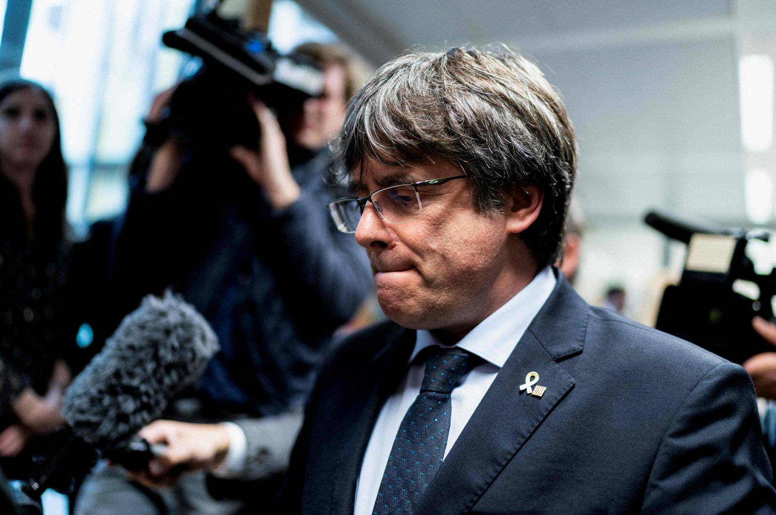 Former Catalan premier Carles Puigdemont leaves after a press conference in Brussels, Belgium, Oct. 14, 2019. (AFP Photo)