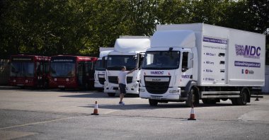 An instructor directs a learner truck driver at the National Driving Centre in Croydon, south London, U.K., Sept. 22, 2021. (AP Photo)