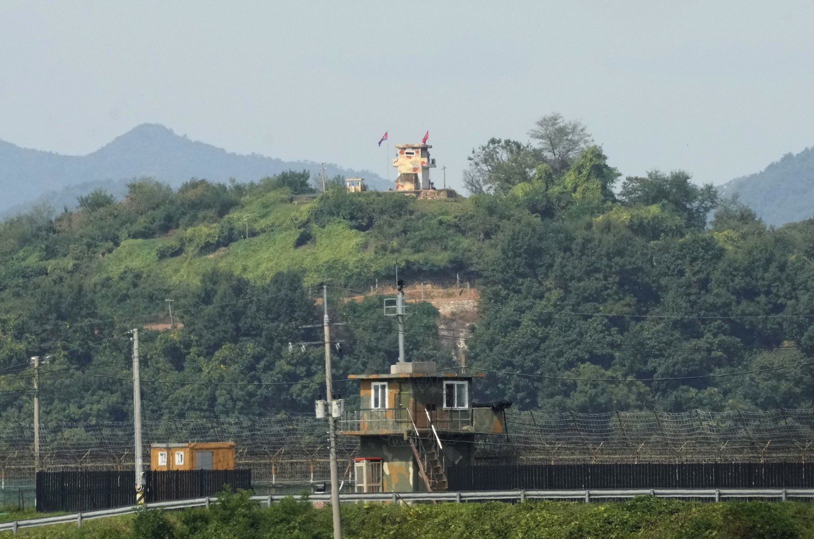 Military guard posts of North Korea (rear) and South Korea (bottom) are seen in Paju, near the border with North Korea, in South Korea, Sept. 24, 2021. (AP Photo)