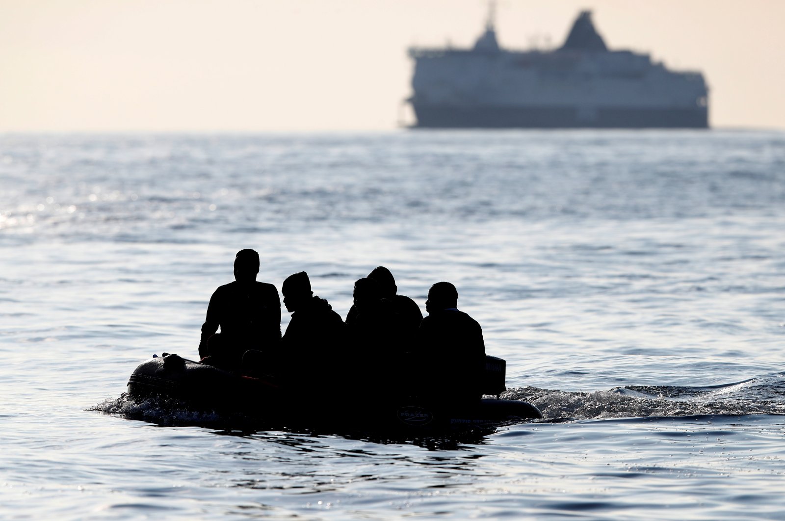 People who say they are from Darfur, Sudan cross the English Channel in an inflatable boat near Dover, Britain, Aug. 4, 2021. (REUTERS Photo)