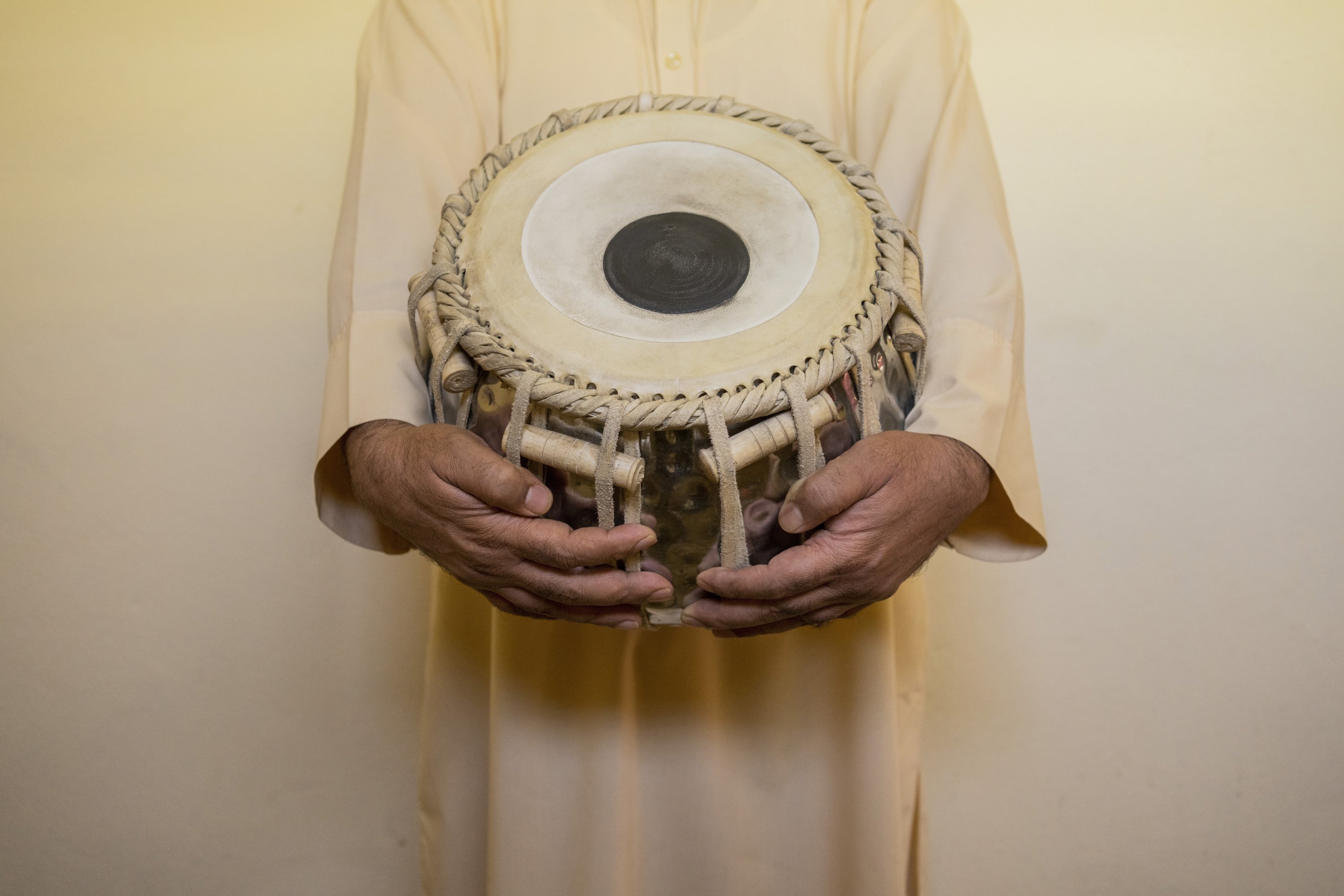 An Afghan musician holds a tabla in Kabul, Afghanistan, Thursday, Sept. 16, 2021. (AP)
