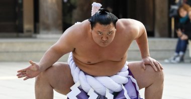 Mongolian-born grand sumo champion yokozuna Hakuho performs the New Year's ring-entering rite at the annual celebration for the New Year at Meiji Shrine in Tokyo, Japan, Jan. 9, 2018. (EPA Photo).