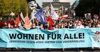 Protesters carry a banner reading "Housing for all" during a demonstration against rising rental costs for flats in Berlin, Germany, Sept. 11, 2021. (Reuters Photo)