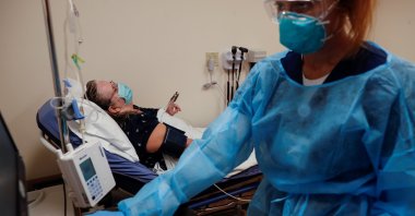 A COVID-19 patient has her blood pressure taken before attempting to receive the Regeneron monoclonal antibody treatment at the Sarasota Memorial Urgent Care Center in Sarasota, Florida, U.S., Sept. 23, 2021. (Reuters Photo)