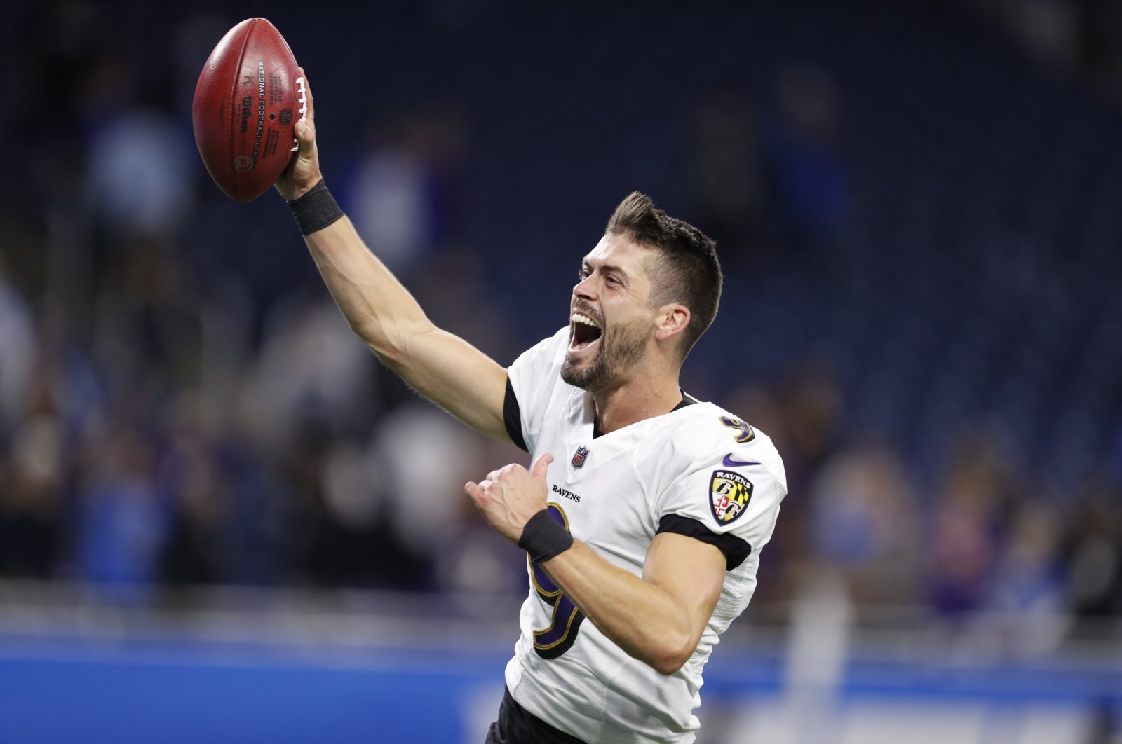 Baltimore Ravens kicker Justin Tucker (9) celebrates while leaving the field after defeating the Detroit Lions at Ford Field, Detroit, Michigan, U.S., Sept. 26, 2021. (Raj Mehta-USA TODAY Sports via Reuters)