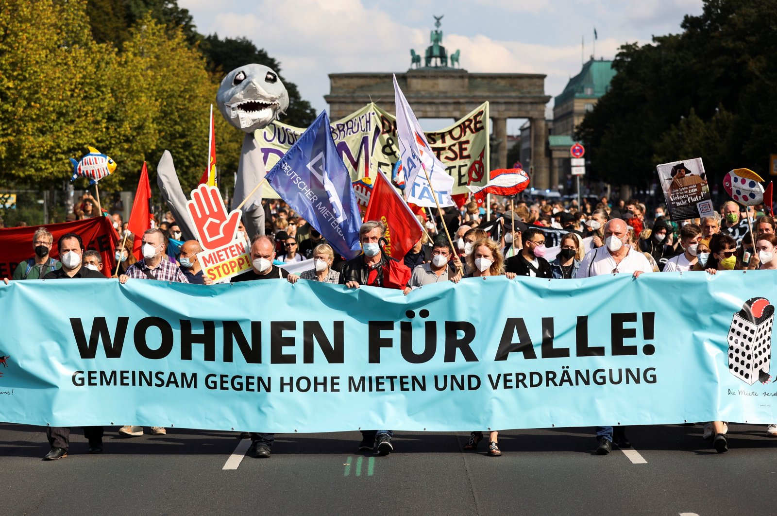 Protesters carry a banner reading "Housing for all" during a demonstration against rising rental costs for flats in Berlin, Germany, Sept. 11, 2021. (Reuters Photo)
