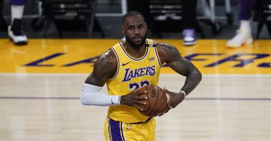 Los Angeles Lakers forward LeBron James controls the ball during an NBA playoff game against the Phoenix Suns, Jun 3, 2021, Los Angeles, U.S. (AP Photo)