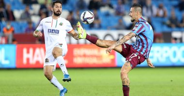 Trabzonspor's Marek Hamsik (R) vies for the ball with Alanyaspor's Emre Akbaba (L) during a Turkish Süper Lig match at Medical Park Stadium, Trabzon, northern Turkey, Sept. 27, 2021. (AA Photo)