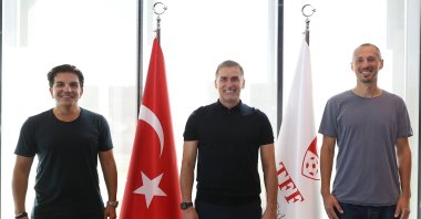 Turkey national football team coach Stefan Kuntz (C) poses with his assistant's Kenan Koçak (L) and Jan-Moritz Lichte at the Turkish Football Federation headquarters, Istanbul, Turkey, Sept. 27, 2021 (DHA Photo)