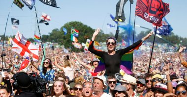 Revellers watch Kylie Minogue perform on the Pyramid Stage during the Glastonbury Festival in Somerset, England, U.K., June 30, 2019. (Reuters Photo)