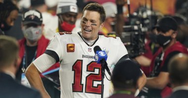Tampa Bay Buccaneers quarterback Tom Brady (C) speaks after the NFL Super Bowl 55 against the Kansas City Chiefs, in Tampa, Florida, U.S., Feb. 7, 2021. (AP Photo)