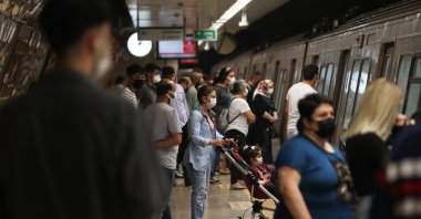 People can be seen abiding by mask rules at a metro station, in Istanbul, Turkey, Sept. 15, 2021. (DHA Photo)