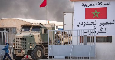 Smoke from burning waste behind a Moroccan border crossing point between Morocco and Mauritania in Guerguerat located in Western Sahara, after the intervention of the royal Moroccan armed forces in the area, Nov. 24, 2020. (AFP)
