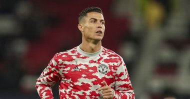 Manchester United's Cristiano Ronaldo warms up ahead of the Champions League Group F soccer match between Manchester United and Villarreal at Old Trafford, Manchester, England, Sept. 29, 2021. (AP Photo)