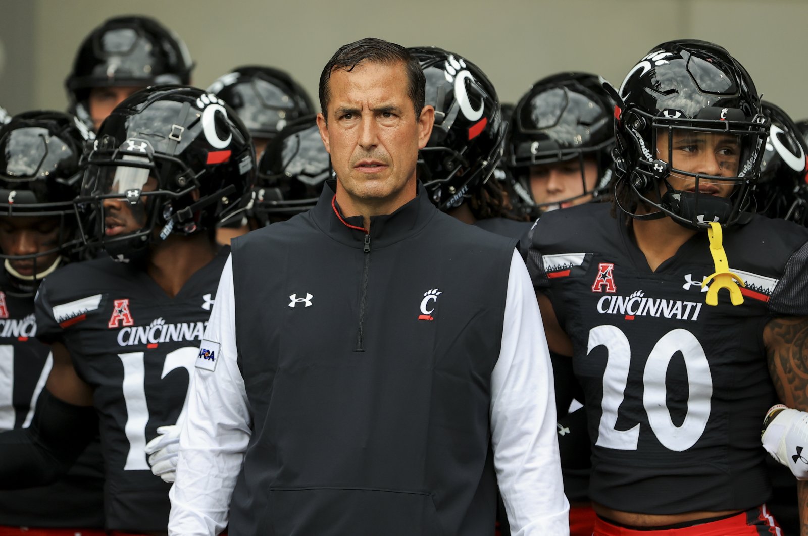 Cincinnati Bearcats coach Luke Fickell stands with his team prior to the game against the Miami (Ohio) Redhawks at Nippert Stadium, Cincinnati, Ohio, U.S., Sept. 4, 2021. (Aaron Doster-USA TODAY Sports via Reuters)
