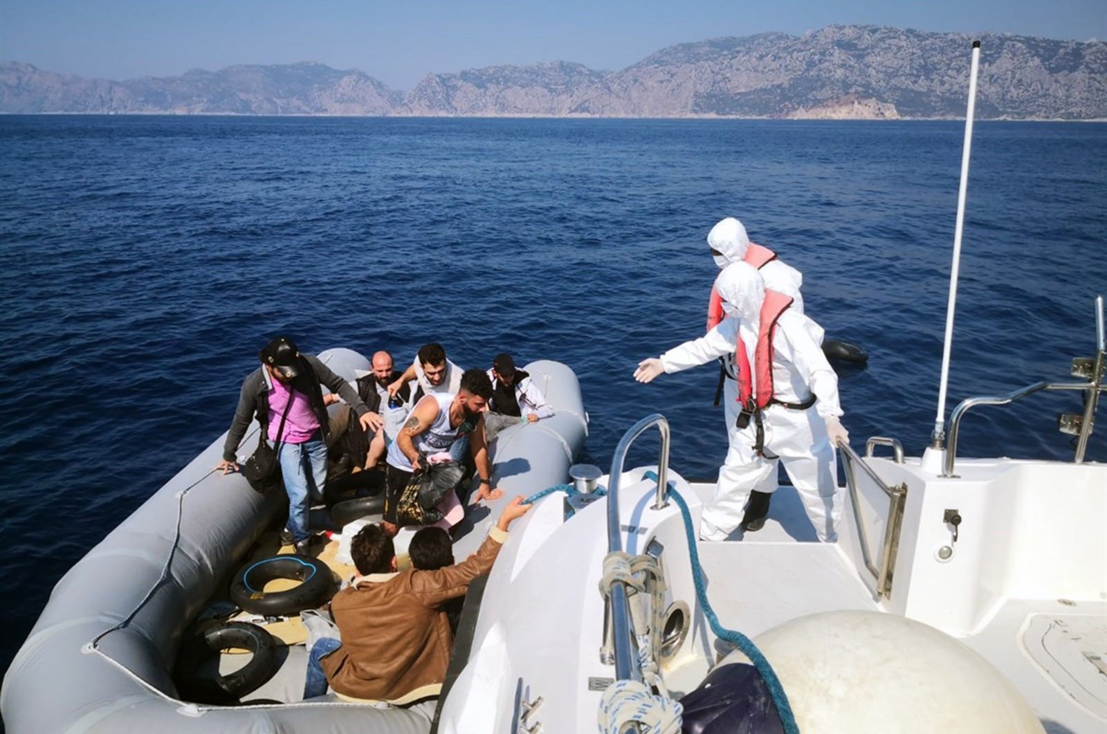 Some 15 irregular migrants pushed back by Greece were rescued by the Turkish Coast Guard Command off Marmaris, Muğla, Turkey, Sept. 16, 2021 (IHA Photo)