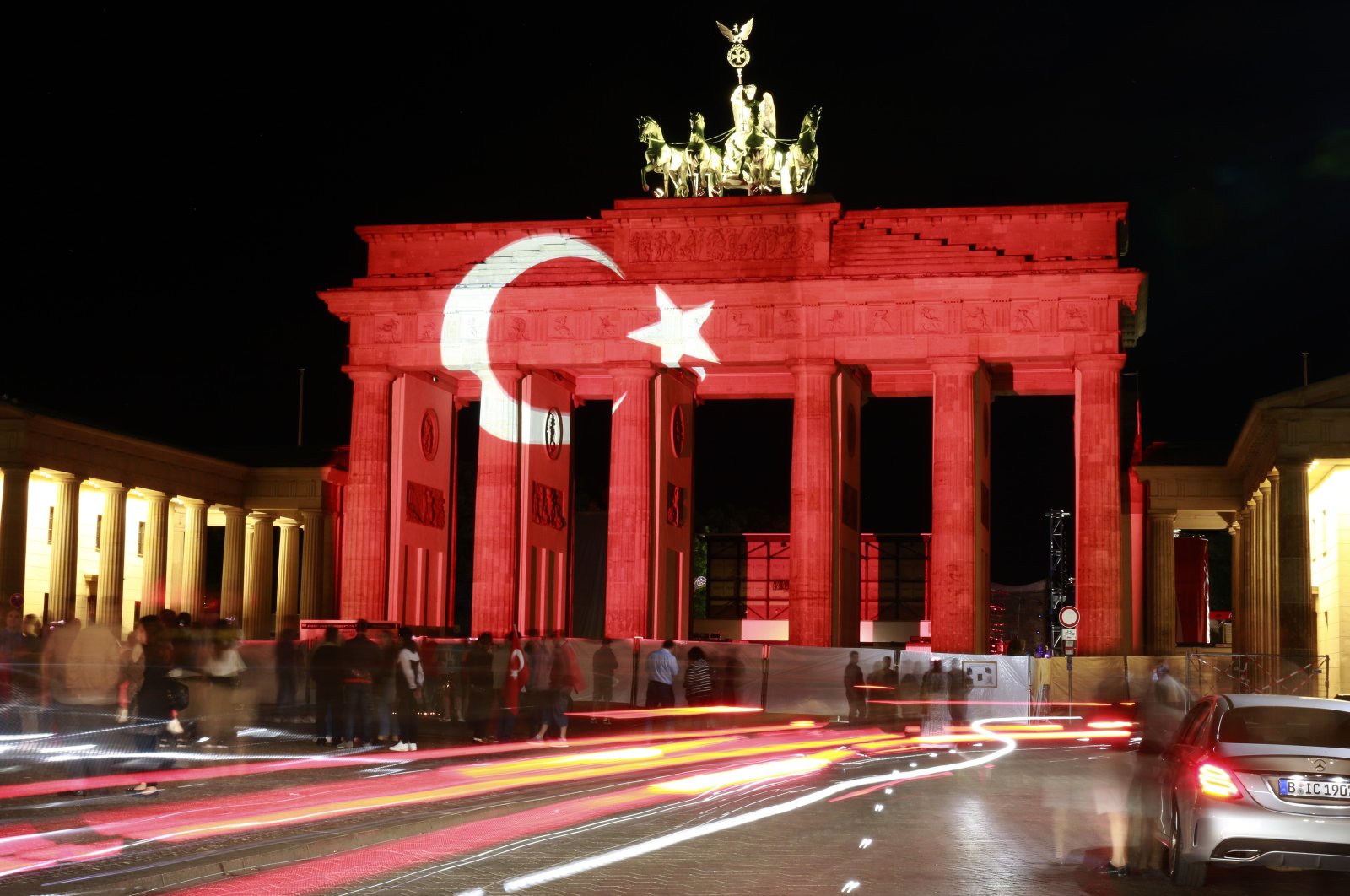 The "Brandenburger Tor" (Brandenburg Gate) is illuminated in the colors of the Turkish flag as a sign of solidarity after the terror attacks in Istanbul, Berlin, Germany, June 29, 2016. (Shutterstock Photo)