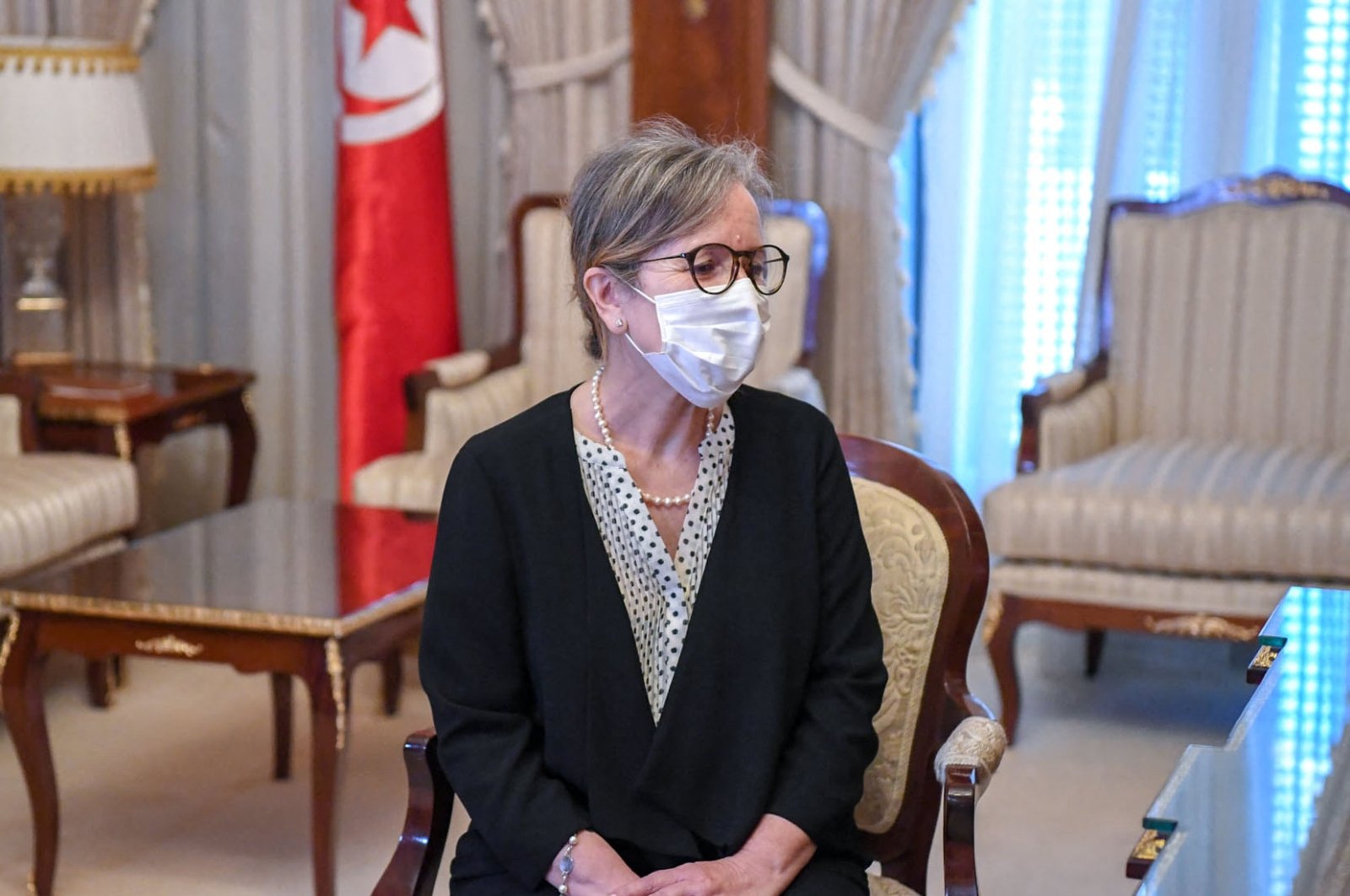 Tunisia's President Kais Saied (not pictured) meets with newly appointed Prime Minister Najla Bouden Romdhane, in Tunis, Tunisia, Sept. 29, 2021.(AFP Photo/Tunisia's Presidency Press Service)
