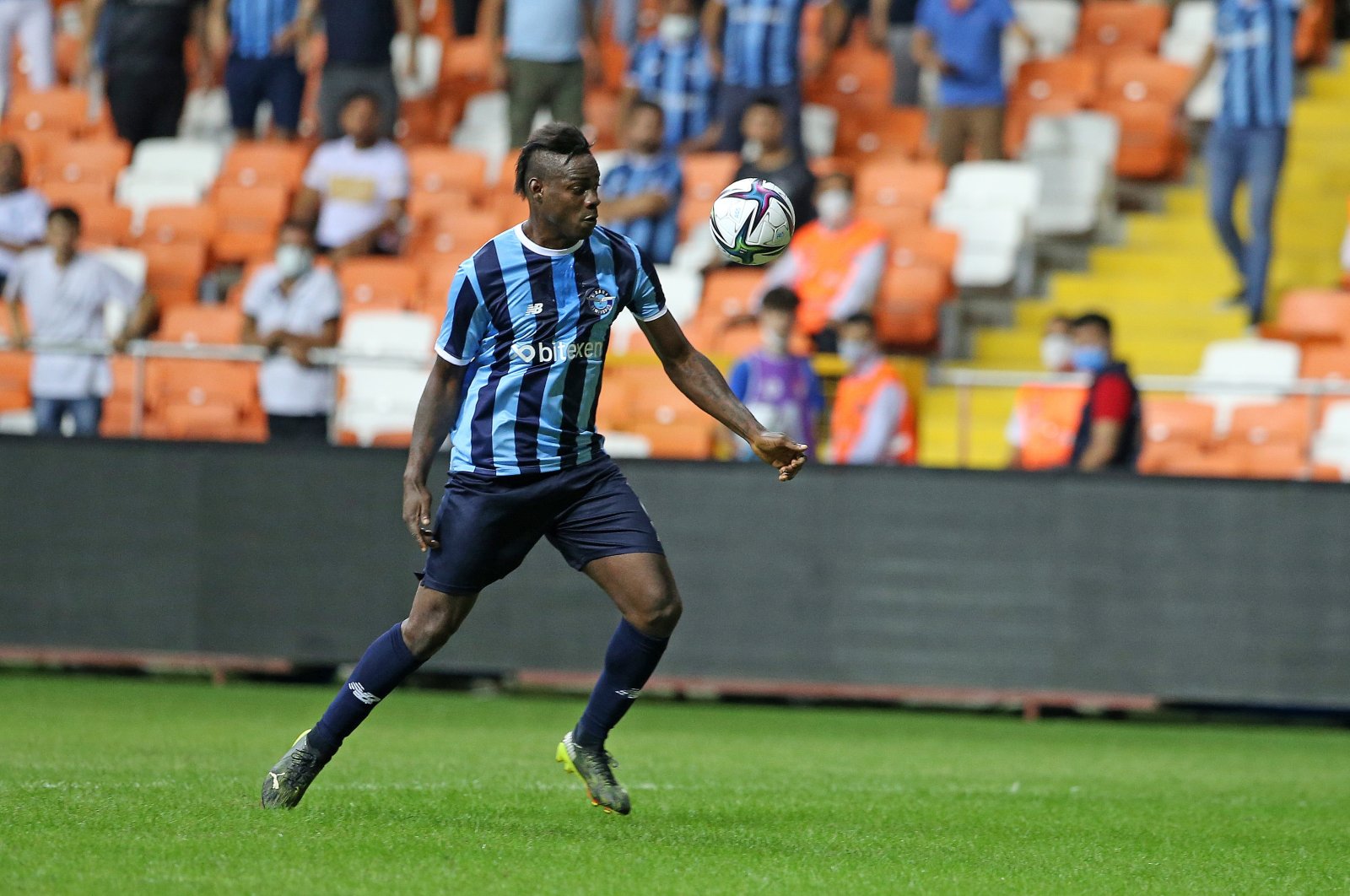 Adana Demirspor's Mario Balotelli controls the ball during a Süper Lig match against Gaziantep, Adana, southeastern Turkey, Sept. 25, 2021.