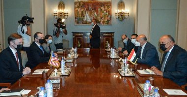 A handout picture released by the Egyptian Ministry of Foreign Affairs shows Egypt's Foreign Minister Sameh Shoukri (R) meeting with U.S. National Security Advisor Jake Sullivan (L), in the capital Cairo, Egypt, Sept. 29, 2021. (Egyptian Ministry of Foreign Affairs via AFP)