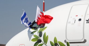 Flags of Israel and Bahrain are seen on a plane of Israeli Foreign Minister Yair Lapid at Bahrain International Airport in Muharraq, Bahrain, Sept. 30, 2021. (Reuters Photo)
