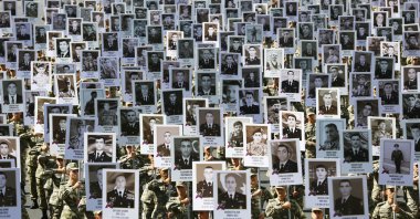On the first year anniversary of the 44-day war started on Sept. 27, 2020 for the liberation of the lands occupied by Armenia, a march was held in Azerbaijan in memory of the fallen soldiers in Baku, Azerbaijan, Sept. 27, 2021. (AA Photo)