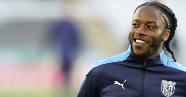 West Bromwich Albion's Romaine Sawyers smiles during warmup before a Premier League match against Leicester City, Leicester, England, April 22, 2021. (AP Photo)