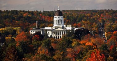 The State House is surrounded by fall foliage in Augusta, Maine, U.S., Oct. 23, 2017. (AP Photo)