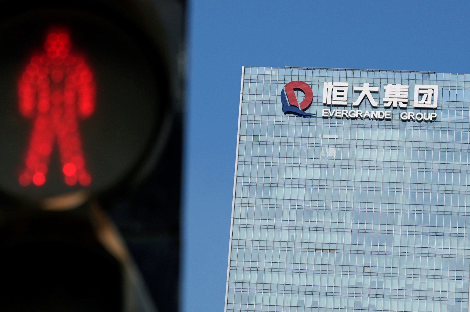 A traffic light is seen near the headquarters of China Evergrande Group in Shenzhen, Guangdong province, China, Sept. 26, 2021. (Reuters Photo)