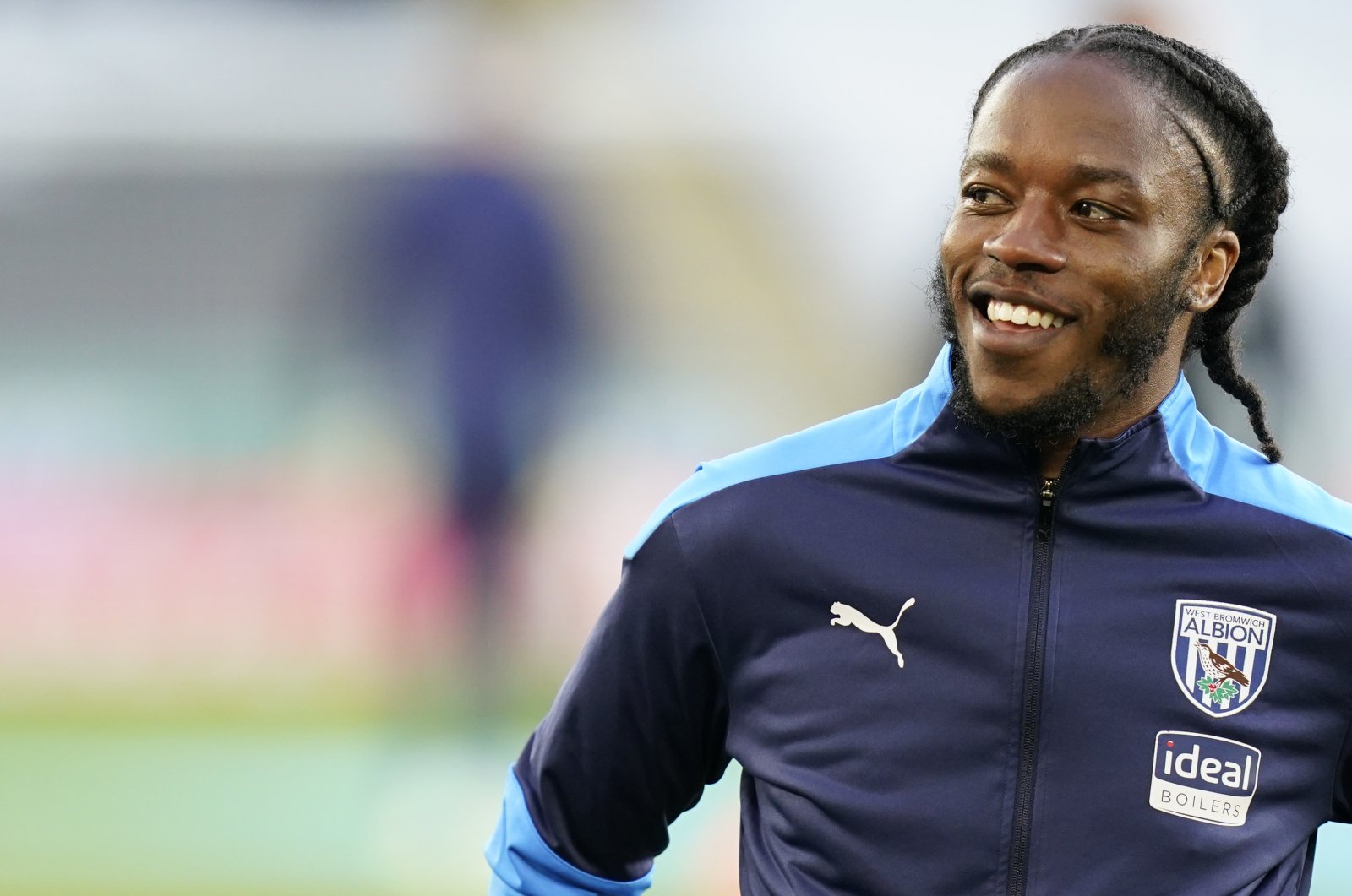 West Bromwich Albion's Romaine Sawyers smiles during warmup before a Premier League match against Leicester City, Leicester, England, April 22, 2021. (AP Photo)