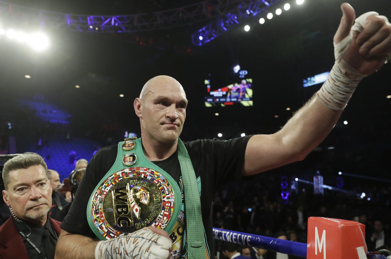 British boxer Tyson Fury celebrates after defeating Deontay Wilder during a WBC heavyweight championship boxing match in Las Vegas, U.S., Feb. 22, 2020. (AP Photo)