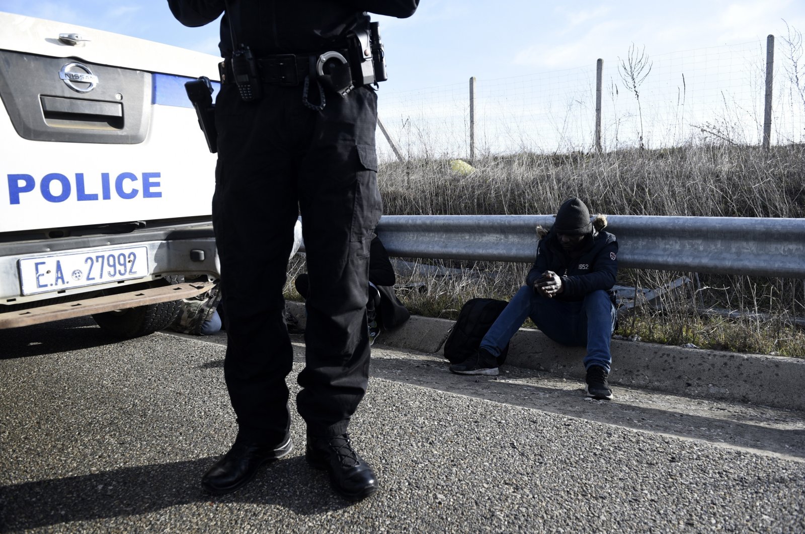 Greek police detain a migrant near the town of Orestiada in Greece's Evros region, at the Turkish-Greek border, March 3, 2020 (AP File Photo)