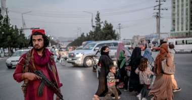 A member of the Taliban stands guard along a road in Kabul, Afghanistan, Sept. 30, 2021. (AFP Photo)
