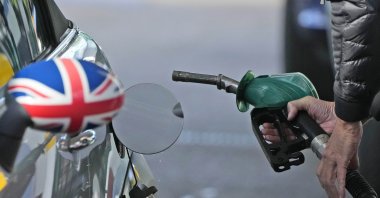 A driver fills a car with fuel at a gas station in London, Sept. 29, 2021. (AP Photo)