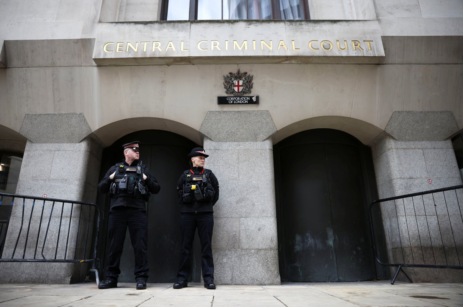 Police officers stand outside the Old Bailey where police officer Wayne Couzens appears for sentencing following the murder of Sarah Everard, in London, Britain, Sept. 30, 2021. (Reuters Photo)