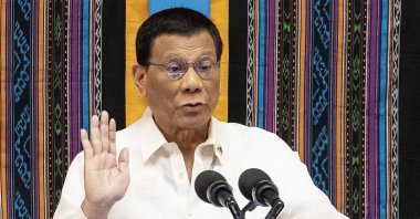 Philippine President Rodrigo Duterte gestures as he delivers his state of the nation address at Congress in Manila, Philippines, July 22, 2019. (AFP Photo)