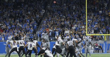 Baltimore Ravens kicker Justin Tucker (9) kicks a 66-yard field goal in the second half of an NFL football game against the Detroit Lions in Detroit, Michigan, U.S., Sept. 26, 2021. (AP Photo)