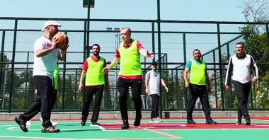 In this video screengrab President Recep Tayyip Erdoğan (C) plays basketball with several ministers and government officials at the Presidential Complex in Ankara, Turkey, Oct. 3, 2021.