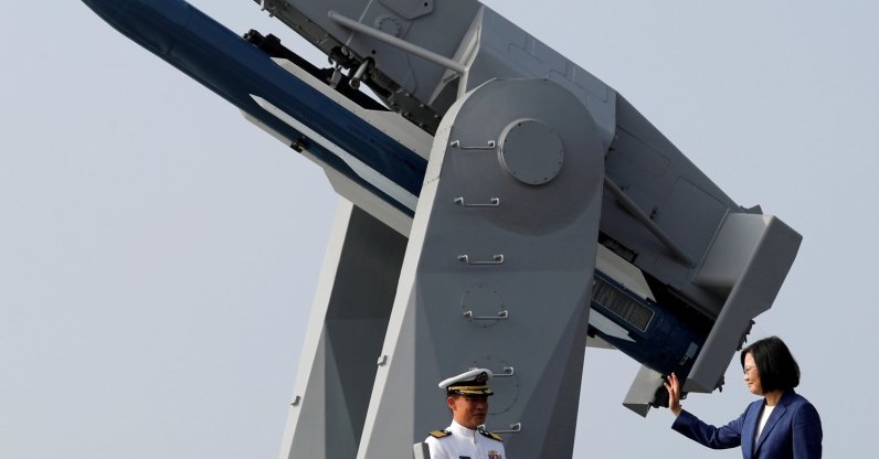 Taiwan's President Tsai Ing-wen waves to the media aboard the PFG-1112 Ming Chuan, a Perry-class guided missile frigate, after a commissioning ceremony at Kaohsiung's Zuoying naval base, Taiwan Nov. 8, 2018. (Reuters Photo)