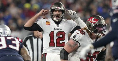 Tampa Bay Buccaneers quarterback Tom Brady (12) calls out a play at the line of scrimmage during the second half of an NFL football game against the New England Patriots, Foxborough, Massachusetts, U.S., Oct. 3, 2021. (AP Photo)