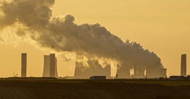 A power plant fires coal from the nearby Garzweiler open-cast mine near Luetzerath, western Germany, Oct. 1, 2021. (AP Photo)