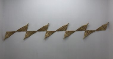 Şakir Gökçebağ's work creating a veritable optical illusion of brooms in "Redimeyd" at Ferda Art Platform in Istanbul, Turkey. (Courtesy of Şakir Gökçebağ)