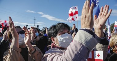 Participants of the United National Movement (UNM) gather for a protest against the arrest of former Georgian President Mikheil Saakashvili, in front of the prison in Rustavi, Georgia, Oct. 4 2021. (EPA)