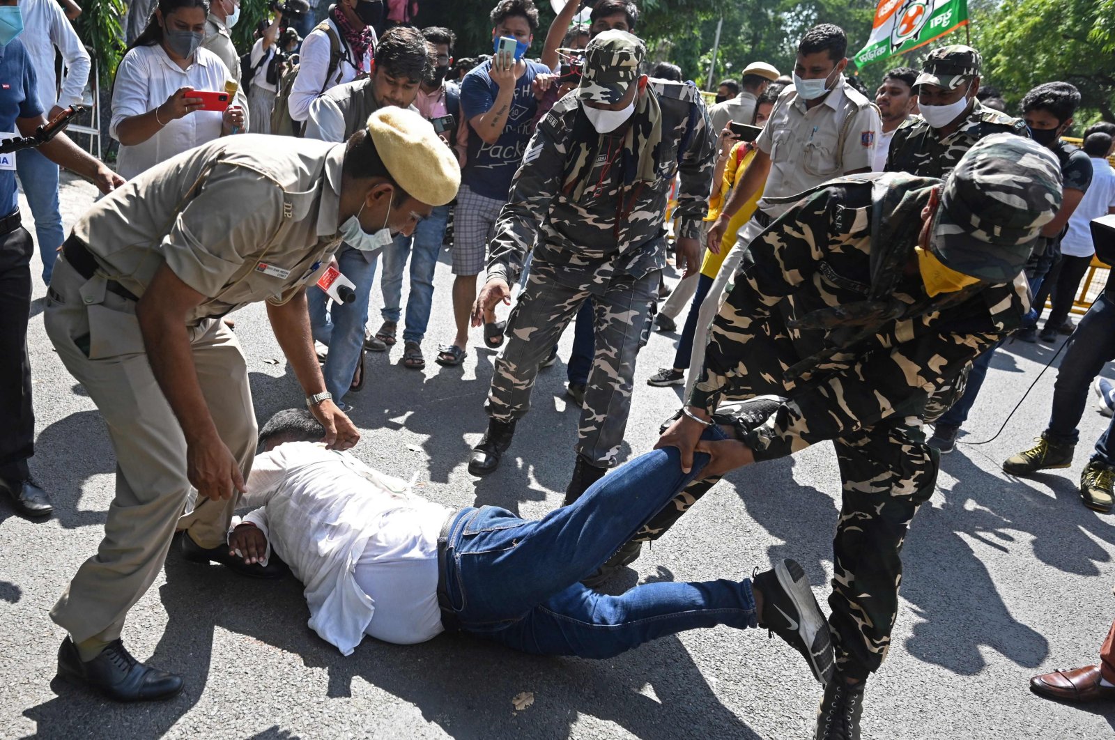 An activist being detained by police during a demonstration a day after clashes involving farmers protesting against agricultural reforms were killed, in New Delhi, India, on Oct. 4, 2021. (AFP Photo)