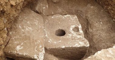 A rare ancient toilet dating back more than 2,700 years, when private bathrooms were a luxury, West Jerusalem, Israel, Oct. 5, 2021. (Israel Antiquities Authority via AP)