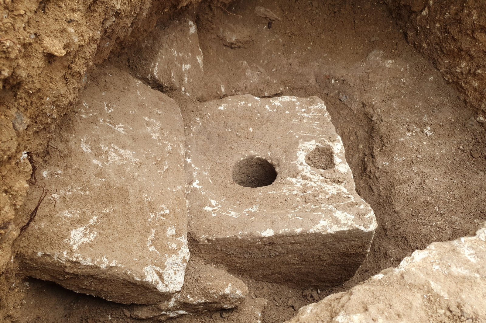 A rare ancient toilet dating back more than 2,700 years, when private bathrooms were a luxury, West Jerusalem, Israel, Oct. 5, 2021. (Israel Antiquities Authority via AP)